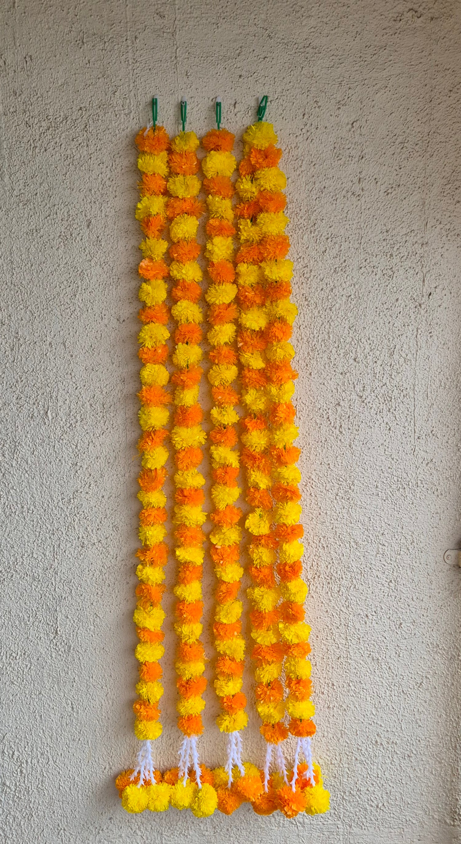 Artificial marigold strings