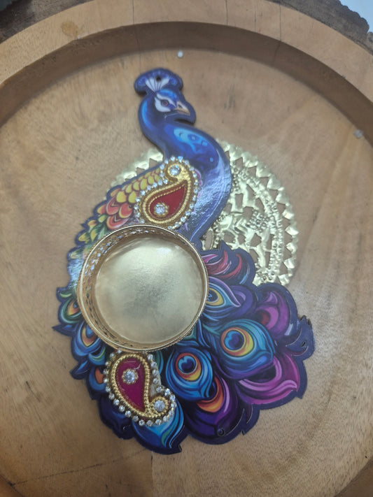 Peacock tealight with wax